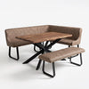 A modern 5-piece dining set featuring a rectangular wooden table with a black metal X-frame base, a corner booth upholstered in brown diamond-quilted faux leather, and a matching rectangular bench.