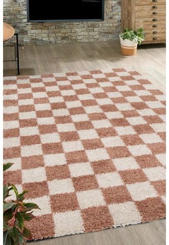 Terracotta check rug with soft shaggy high pile.