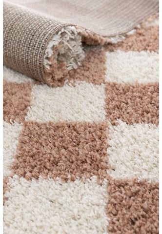 Check pattern rug with thick high pile texture.