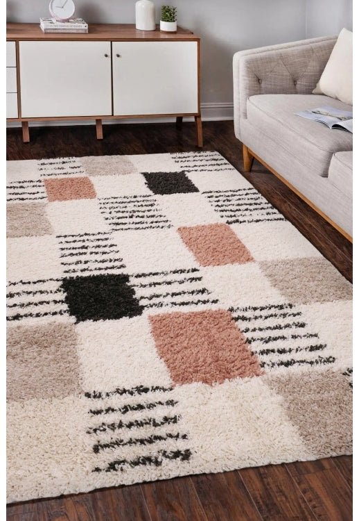 Shaggy rug with modern block pattern design.