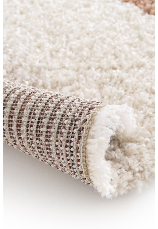 Soft area rug with contemporary linear design.