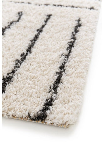 Cozy ivory area rug designed for comfort and sophistication.