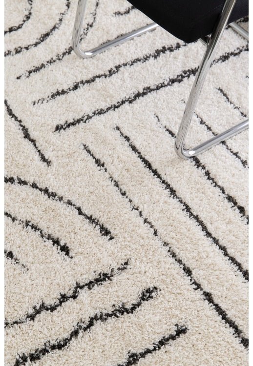 Soft ivory tone rug with light and airy appearance.
