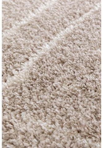 Cozy neutral rug designed for comfort and timeless style.
