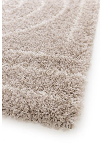 Soft natural tone rug with warm neutral shades.
