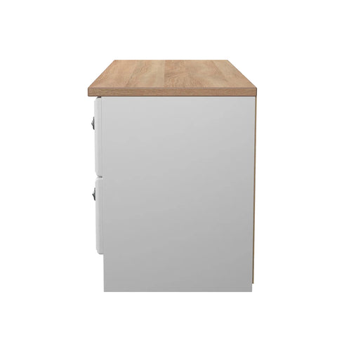 Norfolk White Ash 4 Drawer Bedding Box, Norfolk is a two colour tone Bedroom Furniture which has Bardilon oak top and painted base. Available in choice of 3 colours White, Kashmir and Grey. Fully Assembled. Quick Delivery - Side View