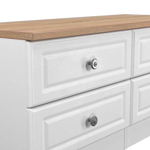 Norfolk White Ash 4 Drawer Bedding Box, Norfolk is a two colour tone Bedroom Furniture which has Bardilon oak top and painted base. Available in choice of 3 colours White, Kashmir and Grey. Fully Assembled. Quick Delivery - Close Up