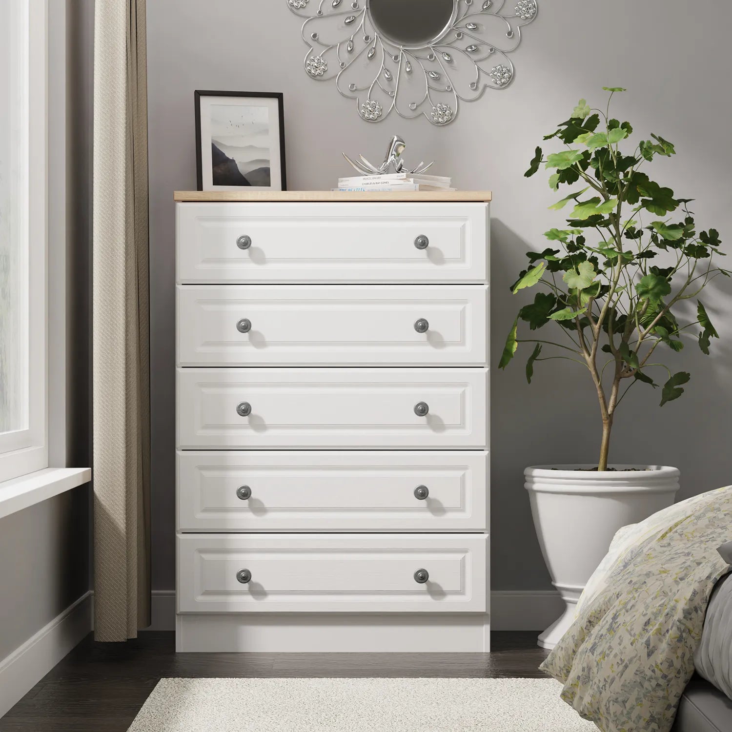 Norfolk White Ash 5 Drawer Chest, Norfolk is a two colour tone Bedroom Furniture which has Bardilon oak top and painted base. Available in choice of 3 colours White, Kashmir and Grey. Fully Assembled. Quick Delivery - Lifestyle Image