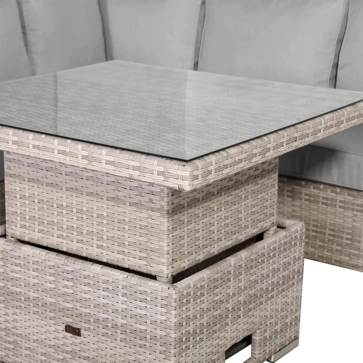 Adjustable rising table converting from coffee to dining height.