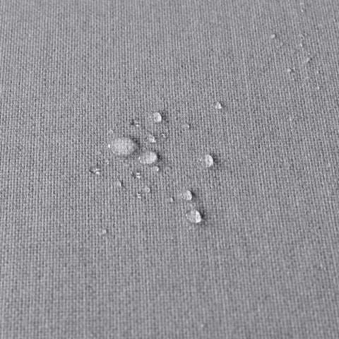 Weather-resistant fabric upholstery designed for garden seating.