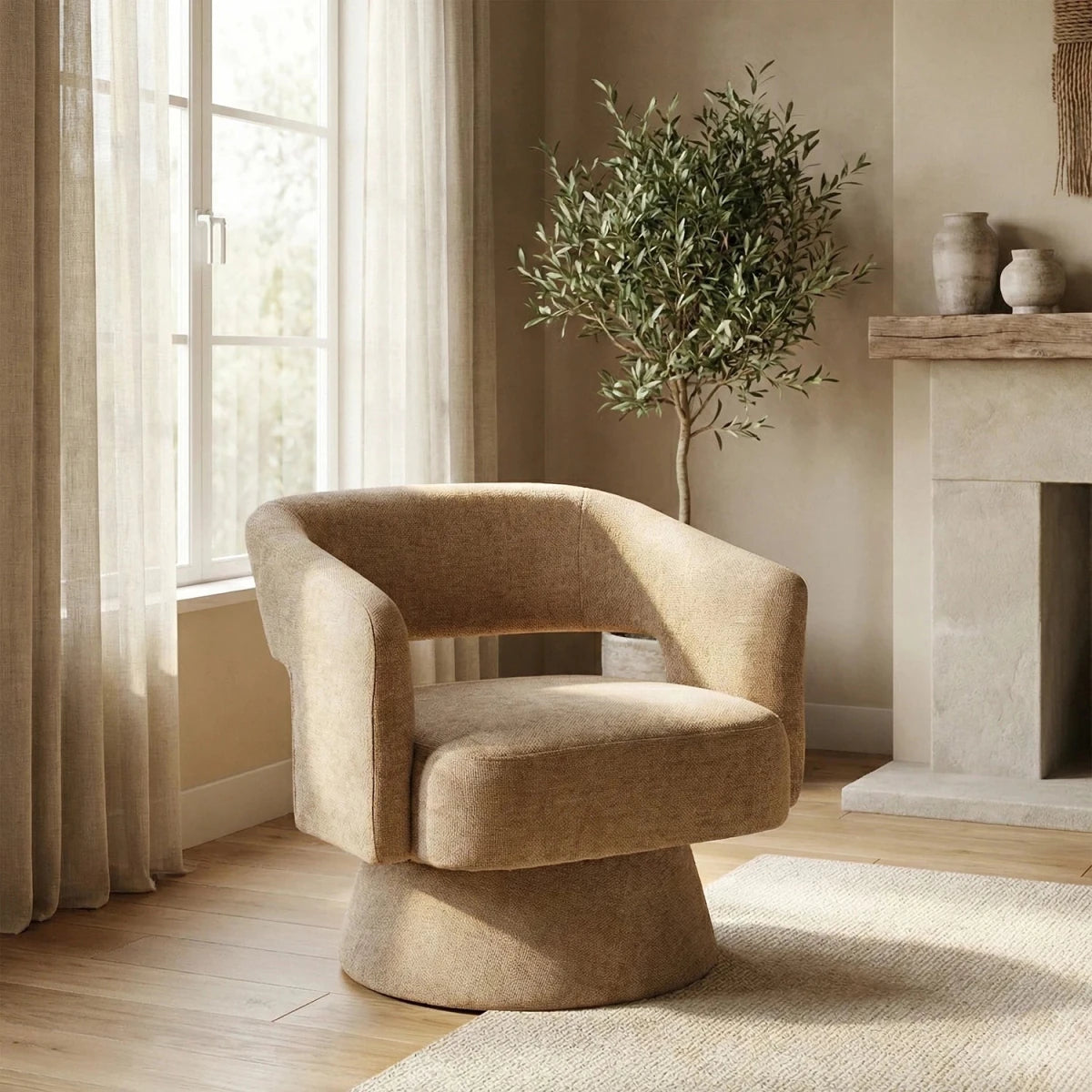 Orla Oatmeal swivel accent chair with 360-degree rotation, sculptural design and cut-out back. 