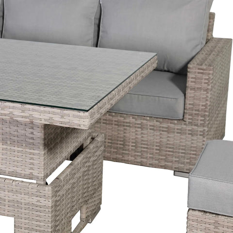 Adjustable rising table converting from coffee to dining height.