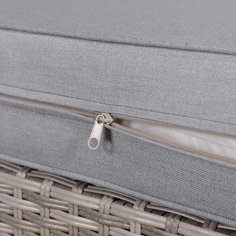 Outdoor cushion with durable zip closure for easy removal.