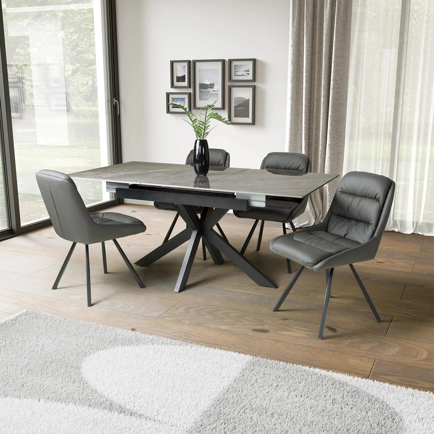 Shop the Oslo Grey ceramic extending dining table with 4 or 6 Grey or Midnight Blue Burnham swivel chairs. Sintered stone top extends 140–180cm.