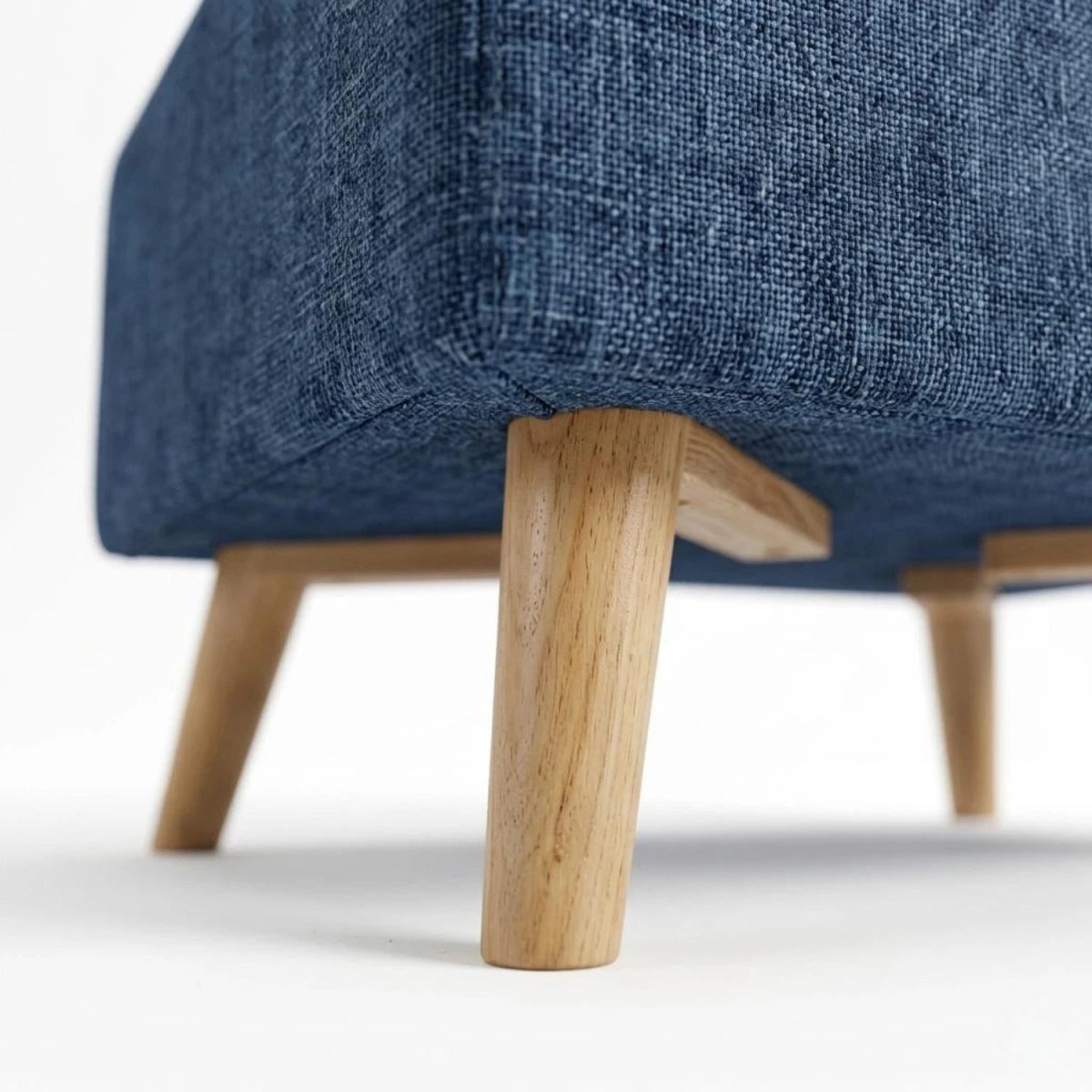 Stylish sofa feet with smooth wood detailing.