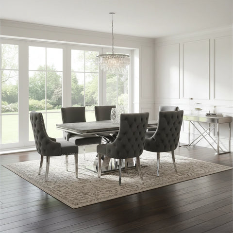 Luxury Ottavia grey marble dining table with 6 Nelson dark grey velvet chairs. Stylish, durable, and perfect for modern dining spaces.