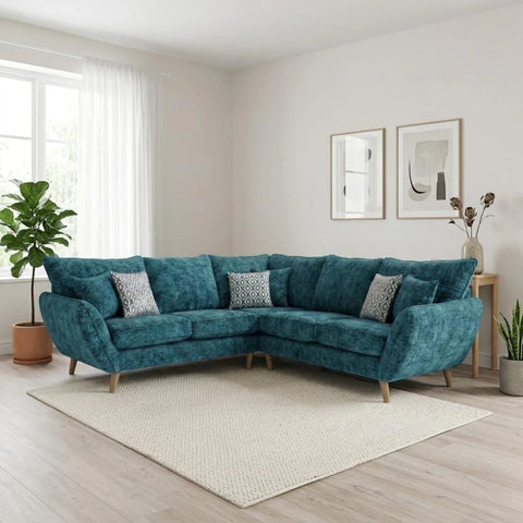 Spacious corner sofa with velvet cushions and angled arms.