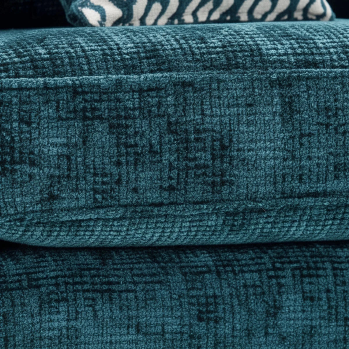 Close-up of soft-touch fabric with fine weave detail.