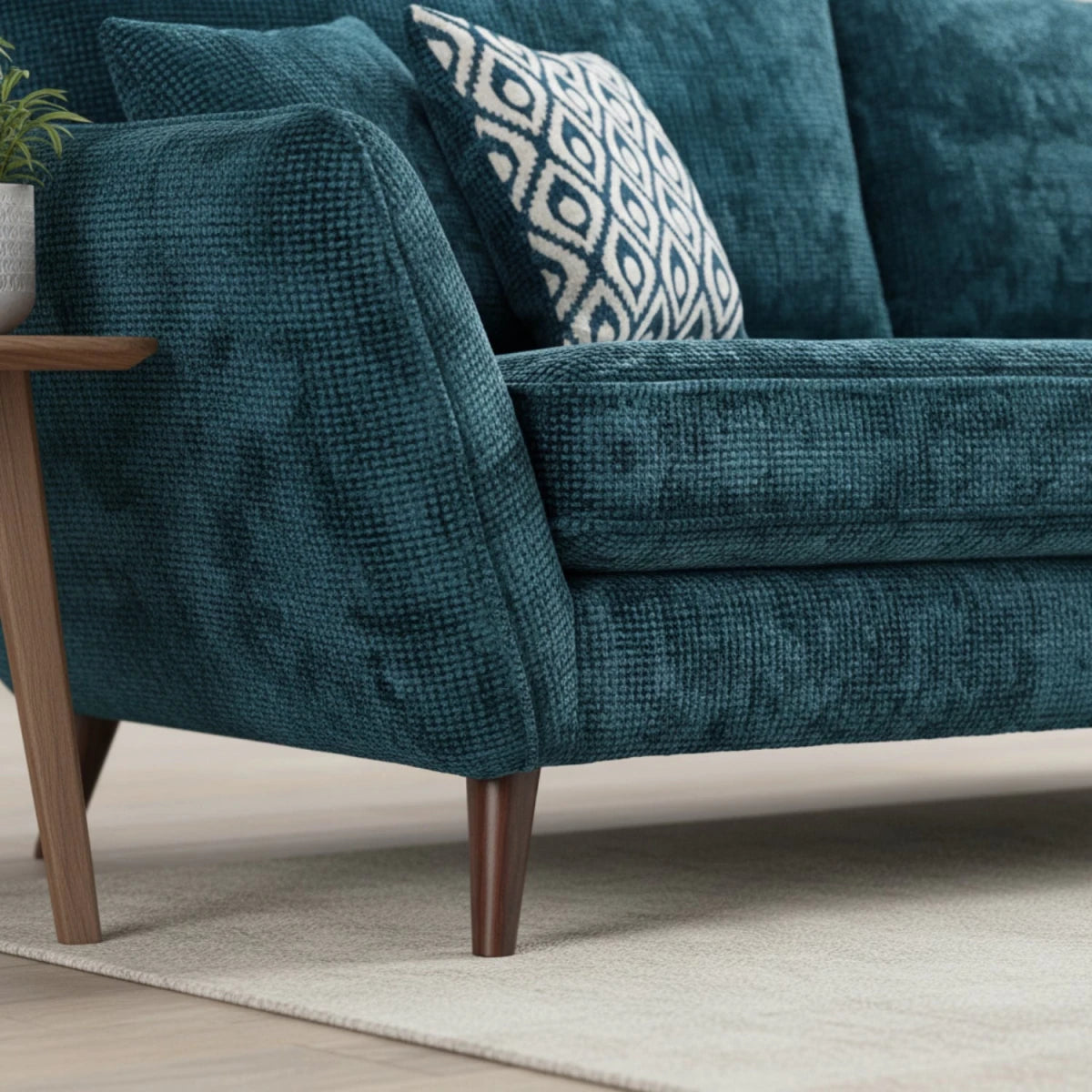 Sturdy wooden legs adding warmth to contemporary sofa design.