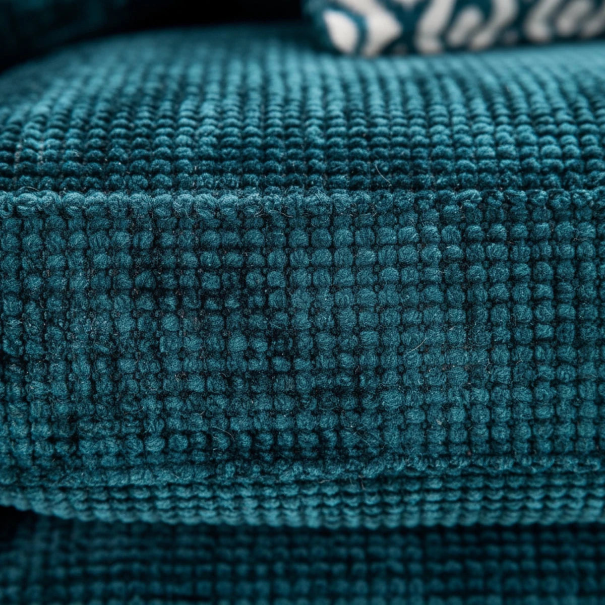 Durable and comfortable fabric upholstery in teal finish.