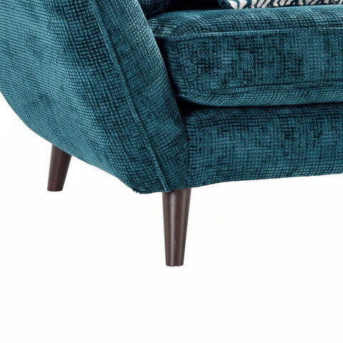Sturdy wooden legs adding warmth to contemporary sofa design.