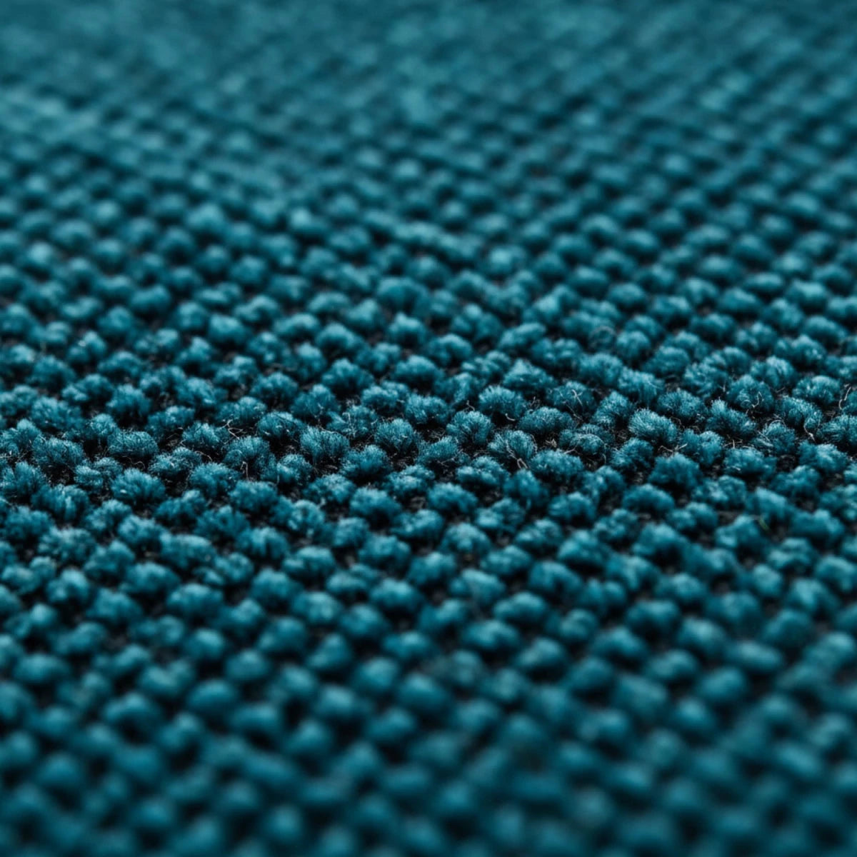 Close-up of soft-touch fabric with fine weave detail.