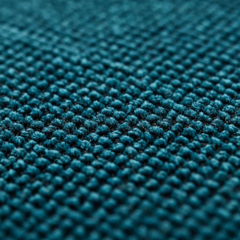 Close-up of soft-touch fabric with fine weave detail.