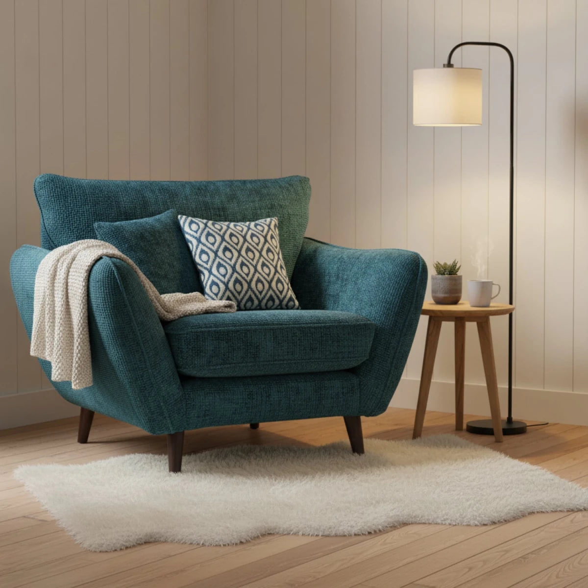 Cozy loveseat sofa with velvet cushions and high back.