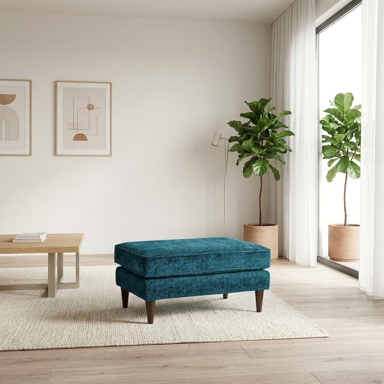 Soft fabric footstool with modern Scandinavian design.