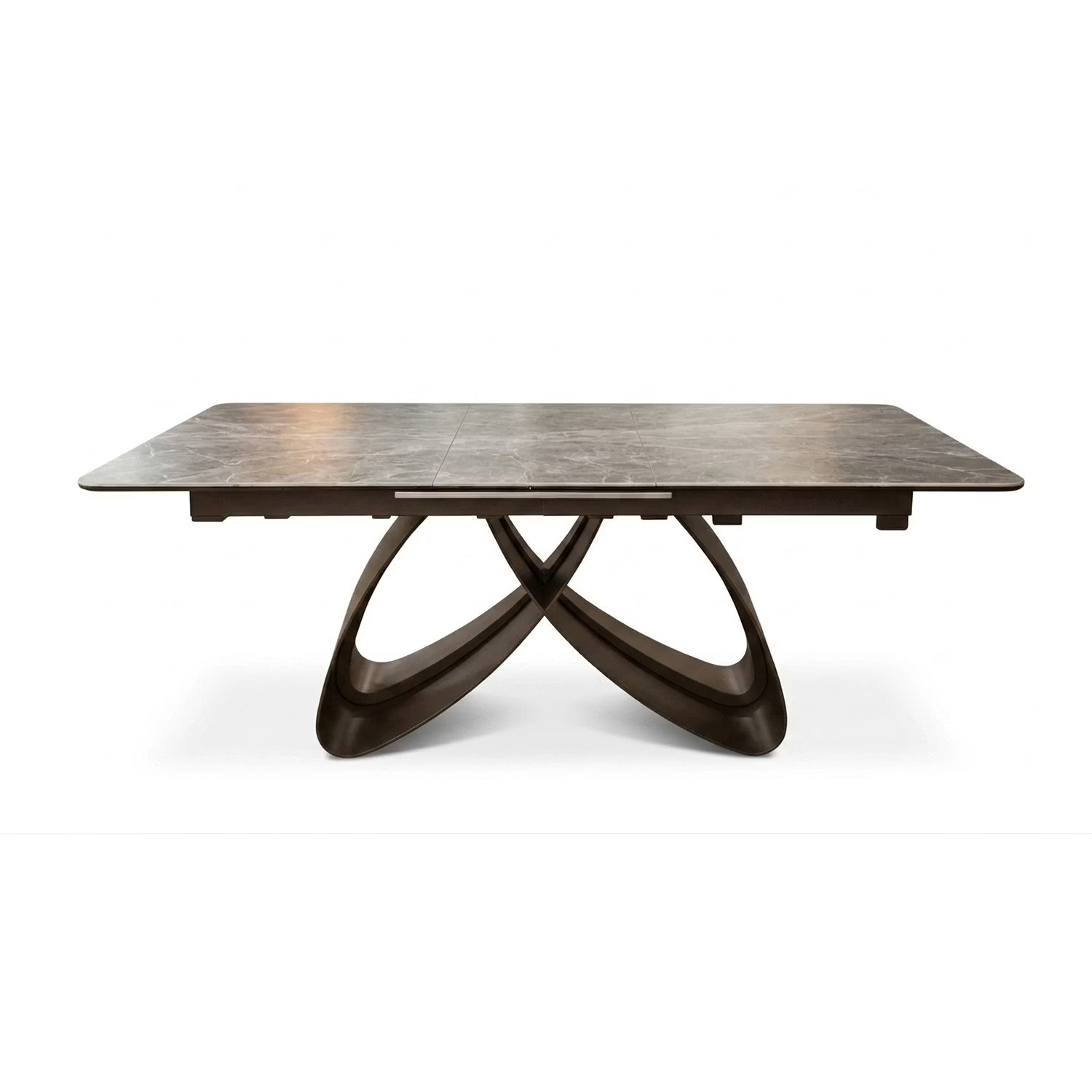 A modern rectangular dining table with a dark wood grain top and a sculptural, interlocking curved metal base in a dark bronze finish, shown on a white background.