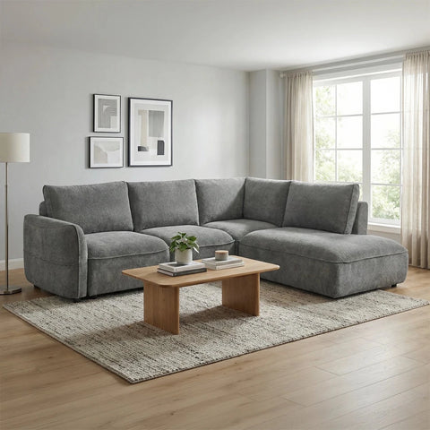 Polly dark grey fabric corner sofa bed with storage chaise, pull-out bed mechanism and left or right hand facing options. Ideal for modern homes.