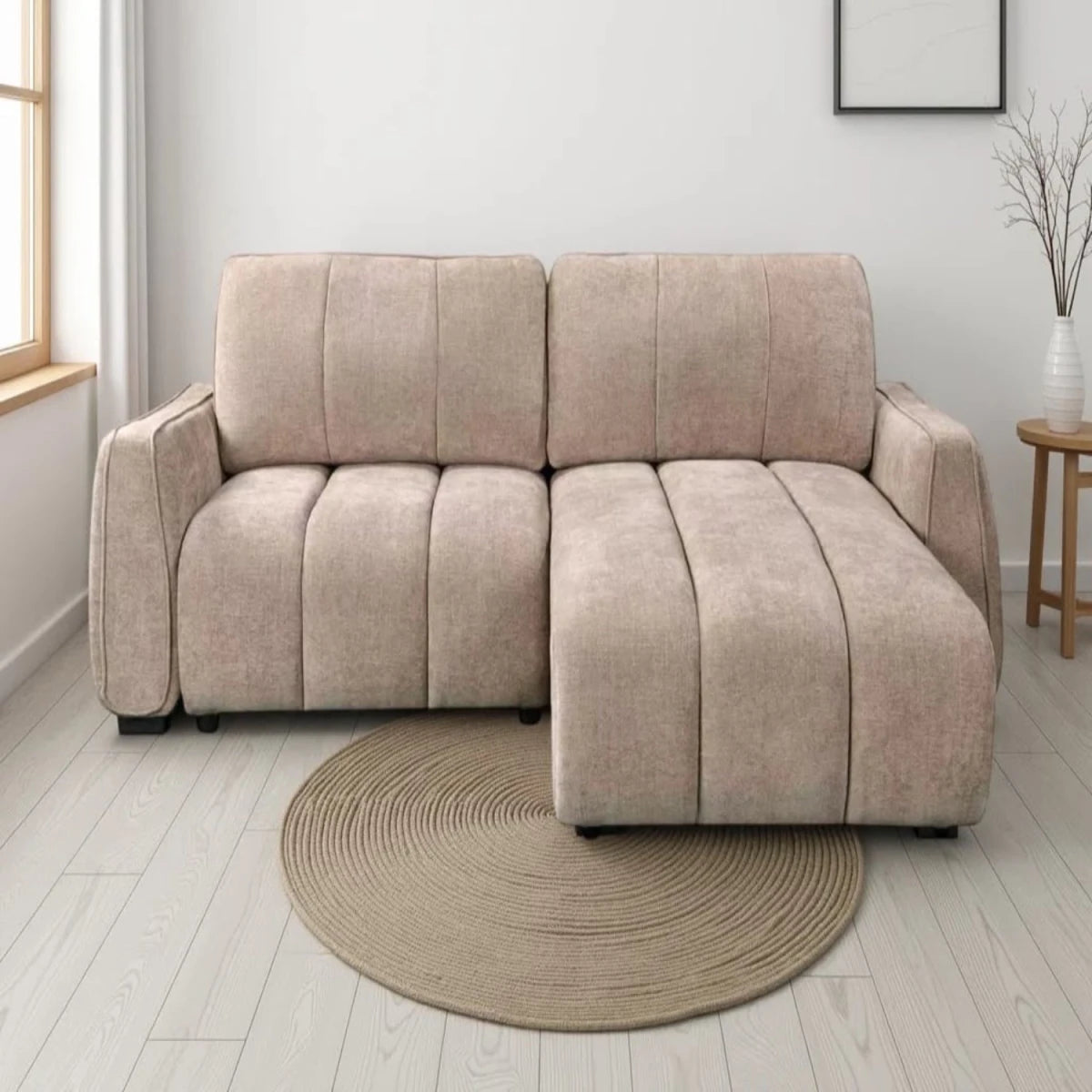 Space saving sofa bed with practical features.