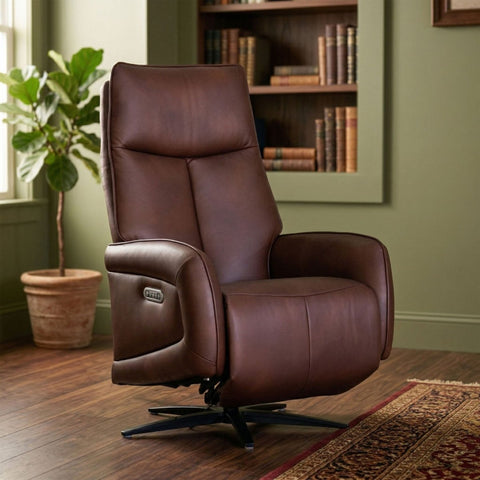 A brown leather swivel recliner chair with a black star base, shown in a styled home office setting with a potted plant, bookshelves, and a patterned rug.