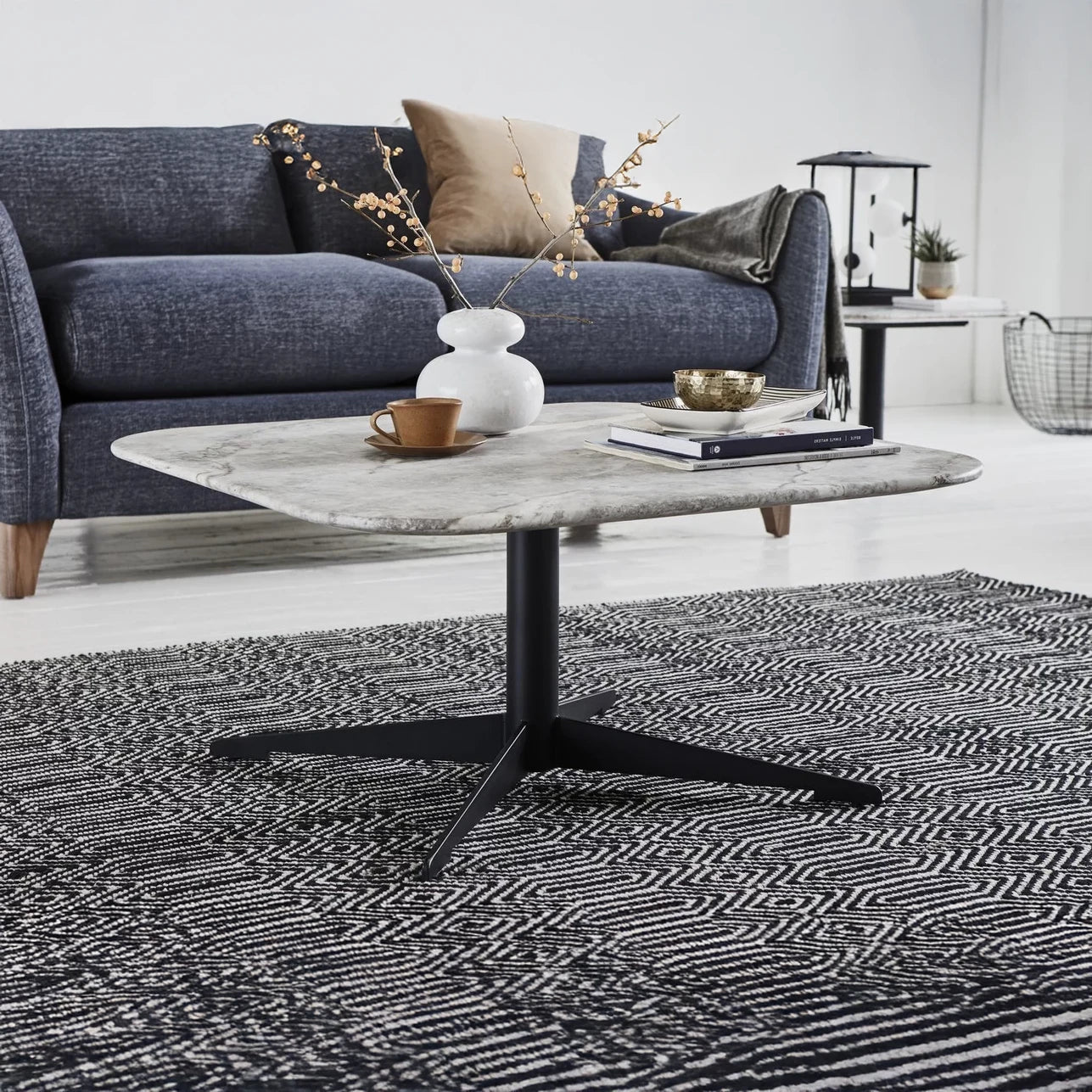 Aria Grey Marble Effect Coffee Table styled in a room