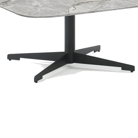 Coffee Table with marble top and black metal base on a white background