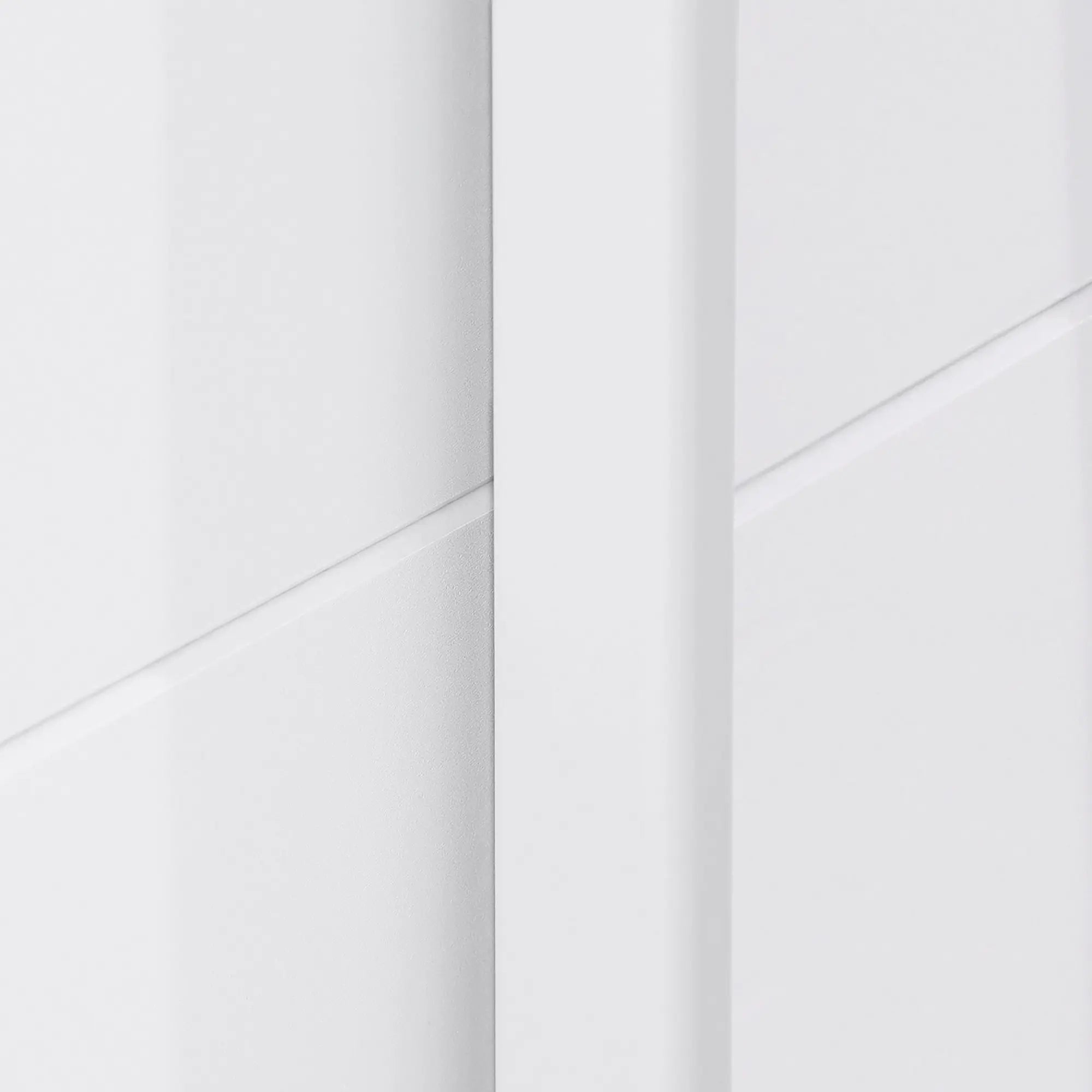 Rauch Forms 3 Door Sliding Wardrobe in Alpine White with Middle Mirror door and White Handles. Available in Small (203cm) and Large (271cm) widths, with options for 210cm or 229cm height. Designed for bedroom storage with customisable interior Pendle Village Furniture Wardrobes - Door Handle