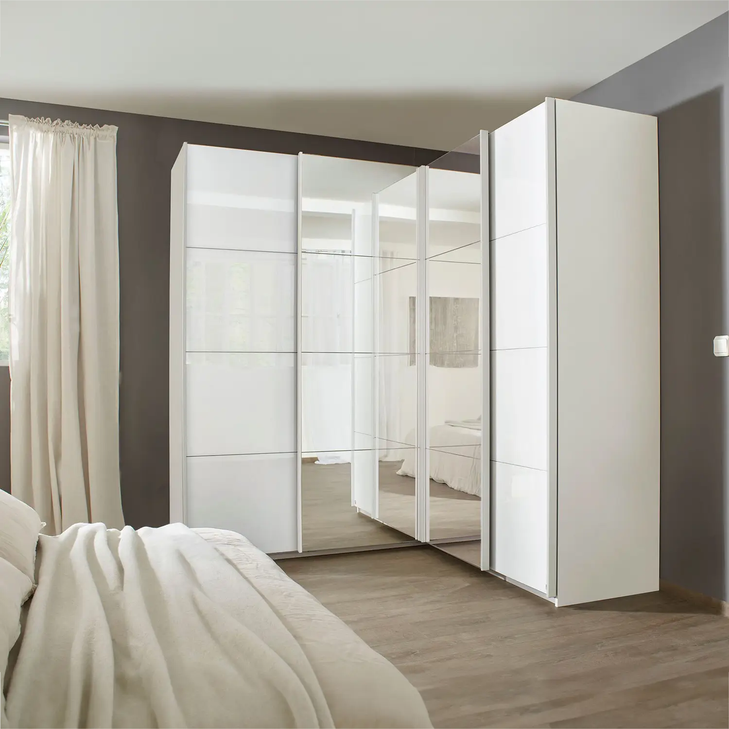 Rauch Lema 4 Door Sliding Corner Wardrobe in White High Gloss - Lifestyle Image 