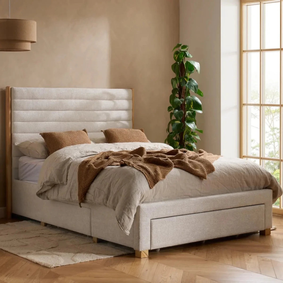 Luxury upholstered bed with soft velvet fabric and storage base.