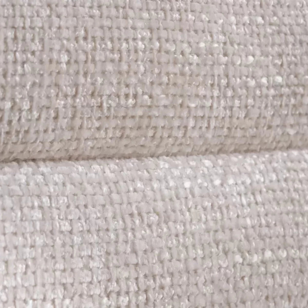Soft grey velvet upholstery with smooth texture and subtle sheen.