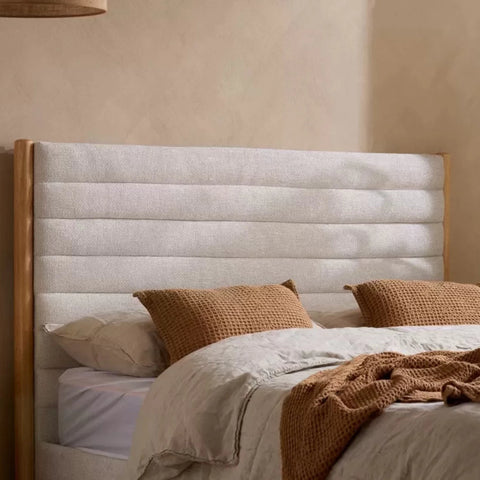 Padded headboard with velvet upholstery for comfort and style.