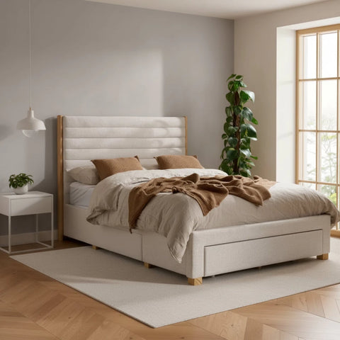 Grey velvet bed with tufted headboard and built in storage drawers.