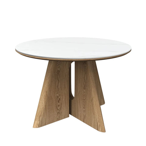 Round dining table with wooden legs and a white glass top on a white background