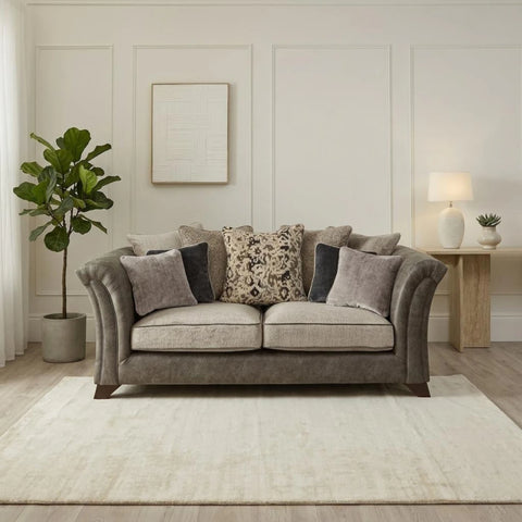 Contemporary 3 seater sofa with fibre back cushions and wooden legs.