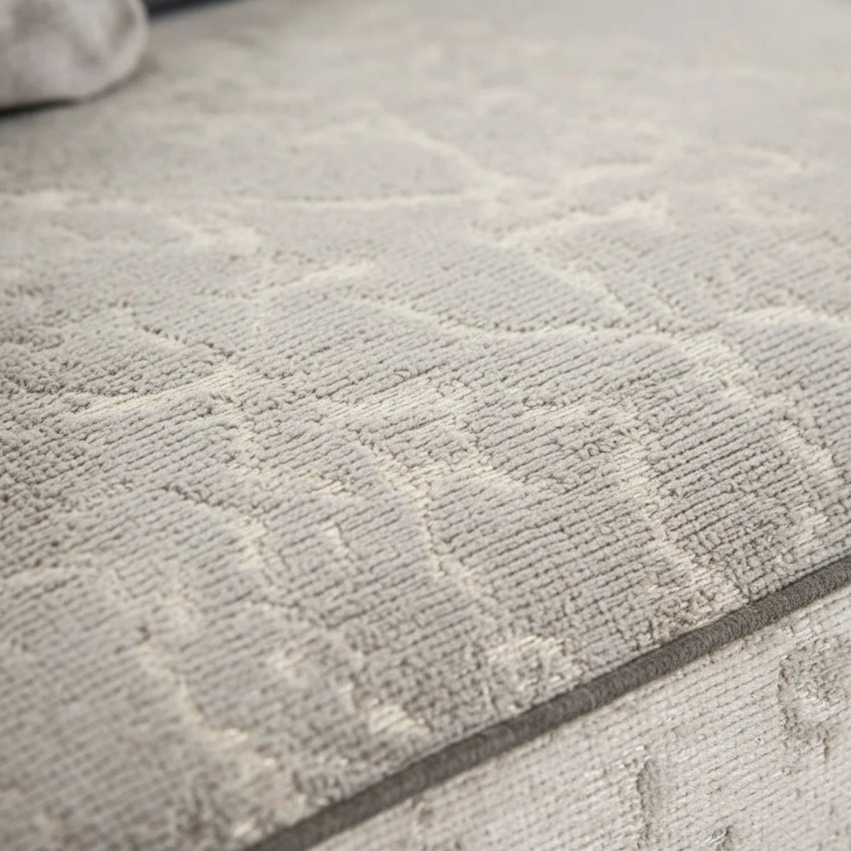 Elegant fabric blend combining soft Kenzo and textured Milo material.