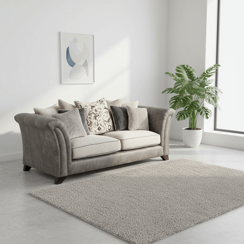 Contemporary 3 seater sofa with fibre back cushions and wooden legs.