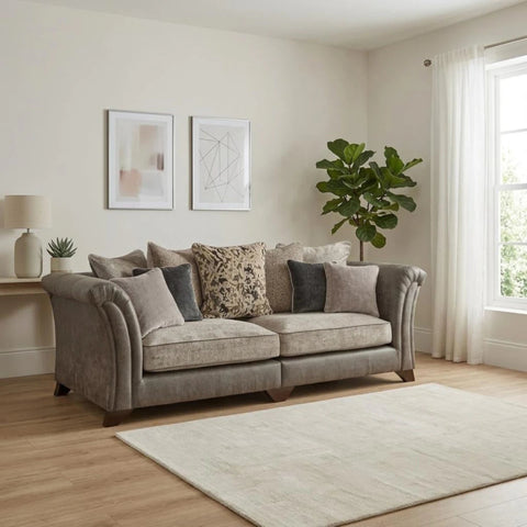 Large 4 seater sofa with deep seating and hardwood wooden legs.