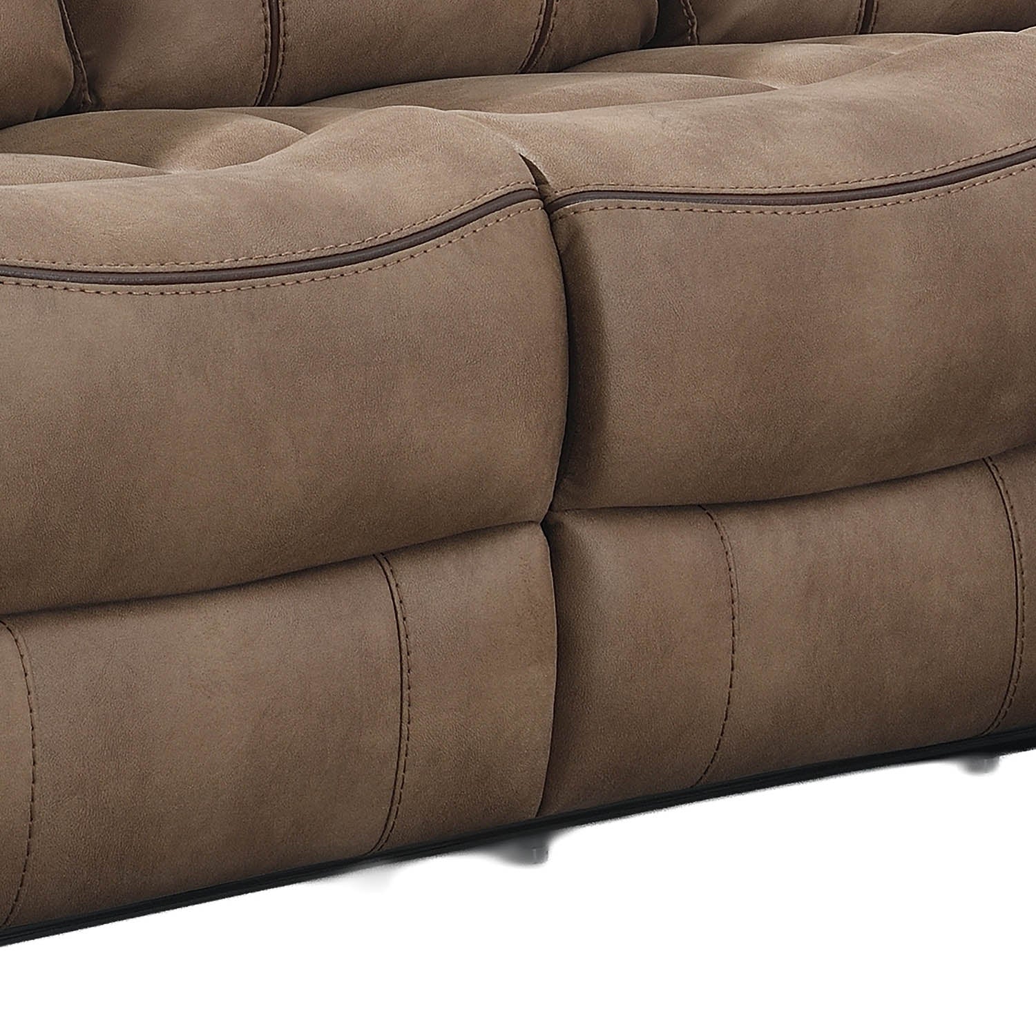 Close-up of a brown tufted upholstered sofa cushion with visible stitching and dark piping, shown against a white background.