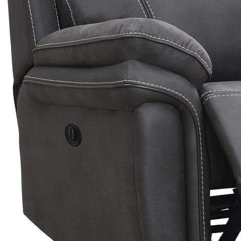 Close-up of a dark gray upholstered recliner chair showing the armrest, white contrast stitching, and a black power control button.