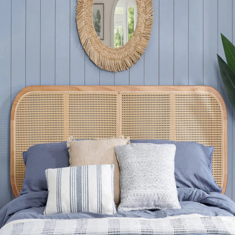 Woven rattan headboard with natural texture and bohemian style.