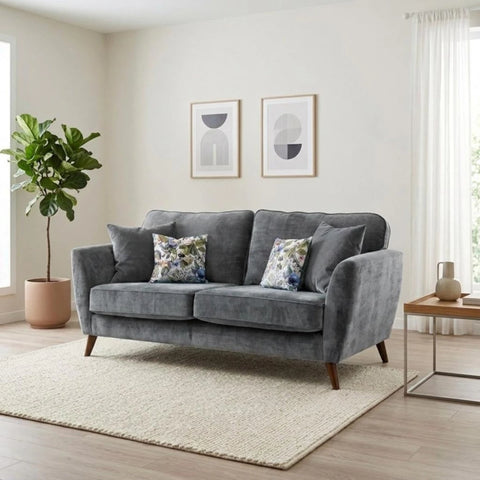 3 seater velvet sofa with deep cushions and classic style.
